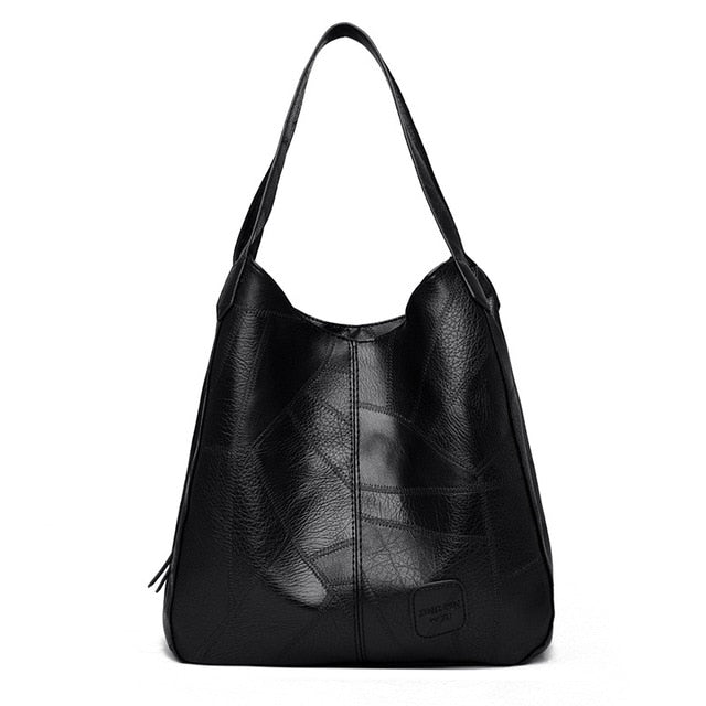 Bolsa Madrid - Couro Premium